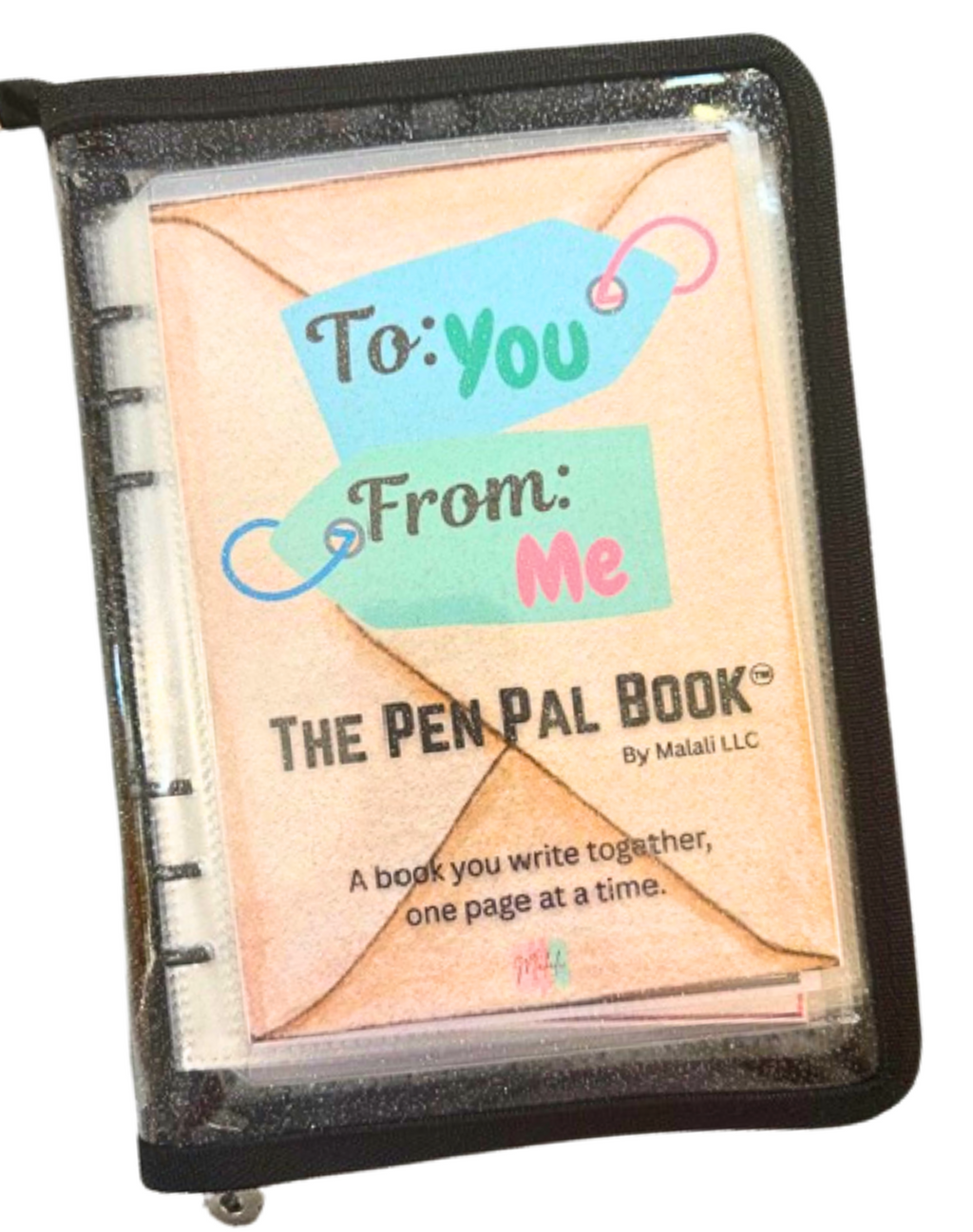 Pen pal book with 'To: You From: Me' text and stationery items.