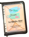Pen pal book with 'To: You From: Me' text and stationery items.