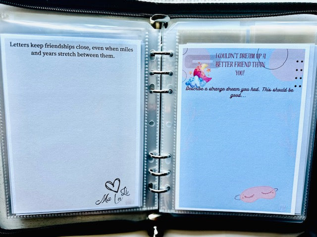 Open notebook with a page featuring text and a cartoon character, with another page showing text.